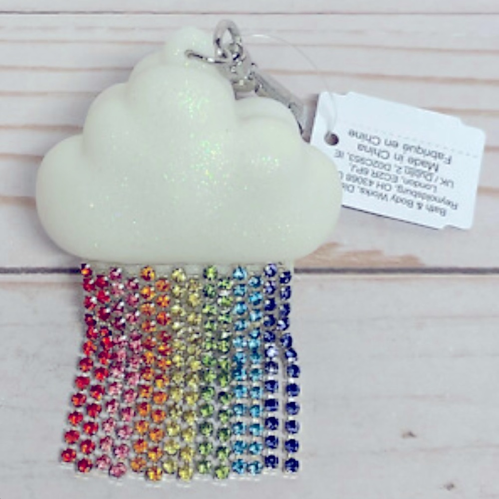 RARE NWOT Bling Rainbow Cloud Pocketbac hand sanitizer holder-Sanitizer included